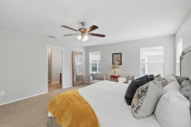 1612 Cambridge Dr, Providence Village, TX 76227 - bedroom featuring visible vents, baseboards, multiple windows, and light carpet