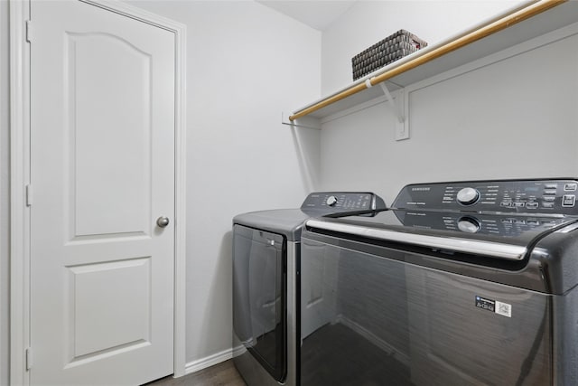 1612 Cambridge Dr, Providence Village, TX 76227 - washroom with laundry area, washer and clothes dryer, dark wood-style flooring, and baseboards