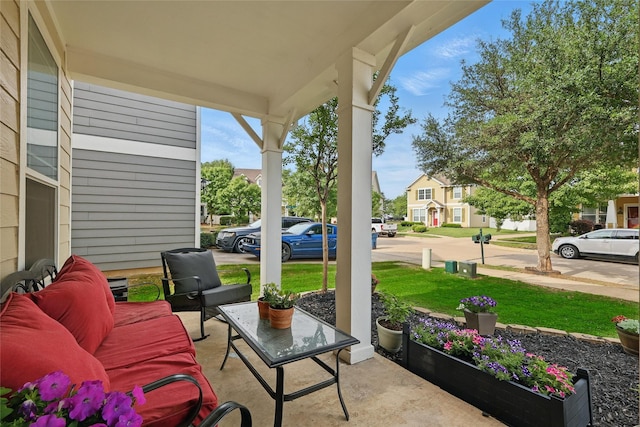1612 Cambridge Dr, Providence Village, TX 76227 - view of patio featuring covered porch and a residential view