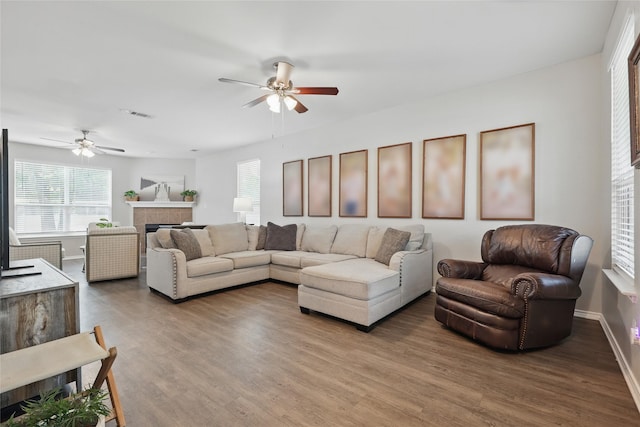 1612 Cambridge Dr, Providence Village, TX 76227 - living room with plenty of natural light, a ceiling fan, and wood finished floors