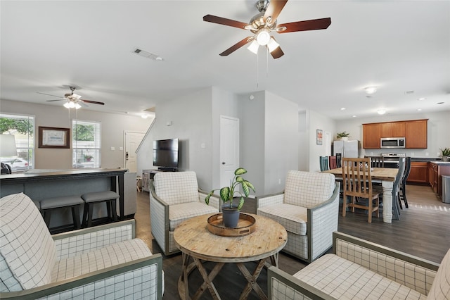 1612 Cambridge Dr, Providence Village, TX 76227 - living room with ceiling fan, visible vents, dark wood finished floors, baseboards, and recessed lighting