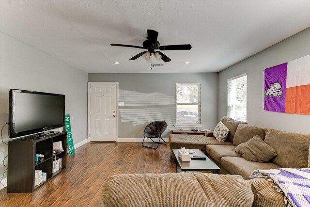 living area featuring recessed lighting, baseboards, a ceiling fan, and hardwood / wood-style flooring