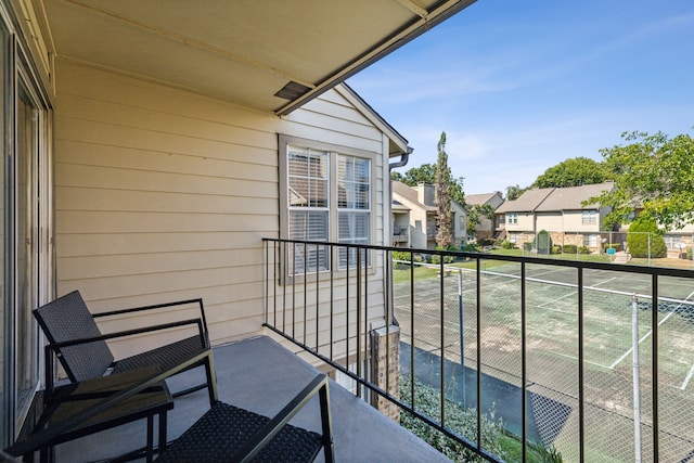balcony featuring a residential view