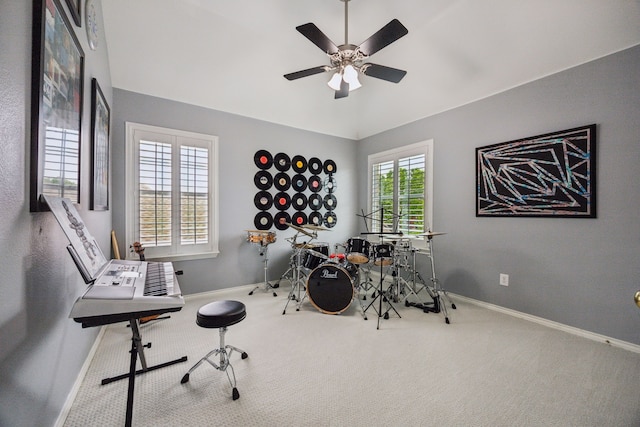 game room with baseboards, a ceiling fan, and carpet floors