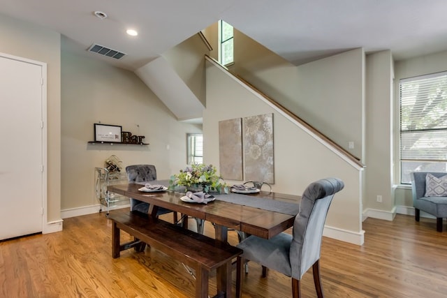 dining space featuring recessed lighting, baseboards, light wood-type flooring, and visible vents