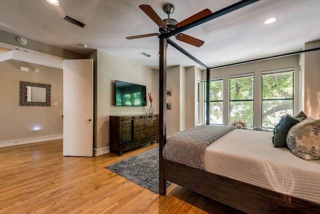 bedroom featuring visible vents, baseboards, ceiling fan, recessed lighting, and light wood-type flooring