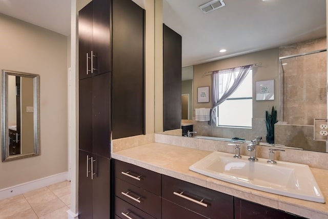 full bathroom with visible vents, tile patterned floors, baseboards, vanity, and recessed lighting