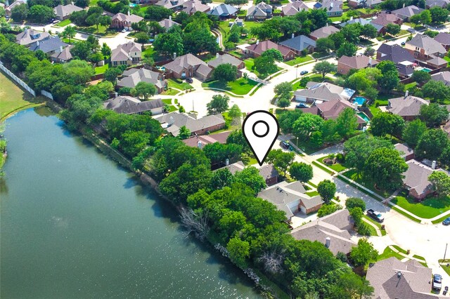 aerial view with a water view and a residential view