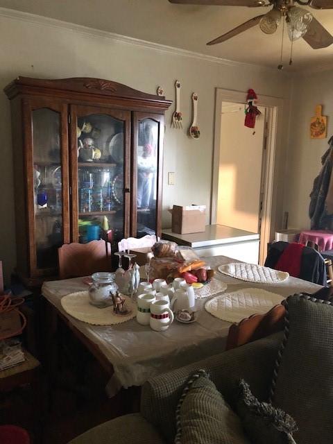 2908 Hardy St, Shreveport, LA 71109 - dining area featuring a ceiling fan and ornamental molding