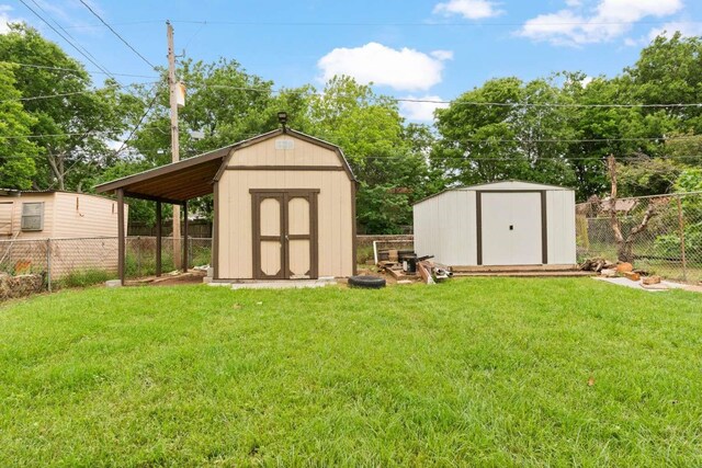 view of shed featuring a fenced backyard
