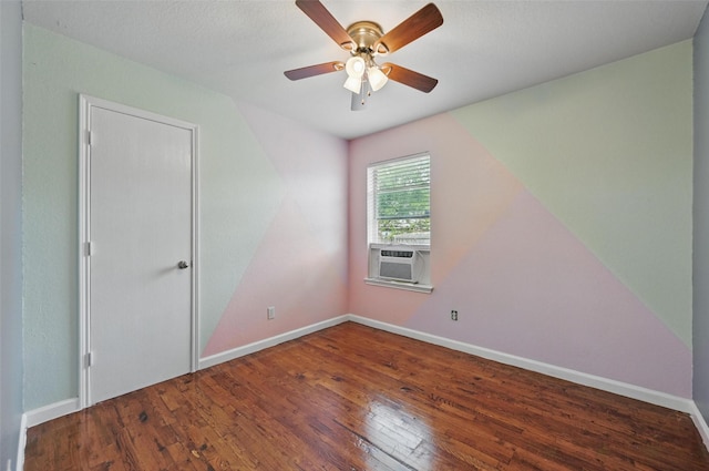 3145 Ronay Dr, Forest Hill, TX 76140 - spare room featuring ceiling fan, hardwood / wood-style flooring, baseboards, and cooling unit