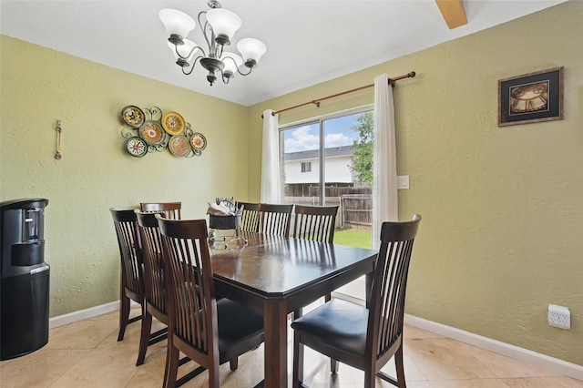 3145 Ronay Dr, Forest Hill, TX 76140 - dining space with baseboards, a notable chandelier, and light tile patterned flooring