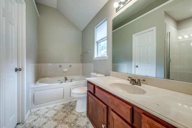 bathroom with a bath, a stall shower, vaulted ceiling, vanity, and toilet