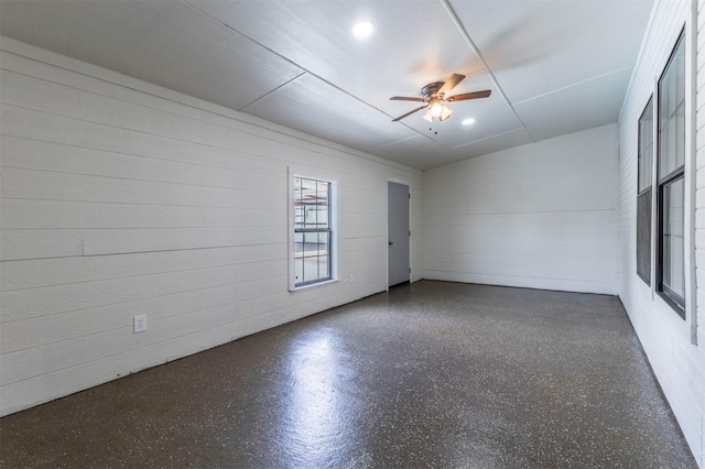 spare room featuring ceiling fan