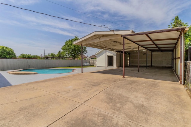 view of swimming pool with fence and a fenced in pool