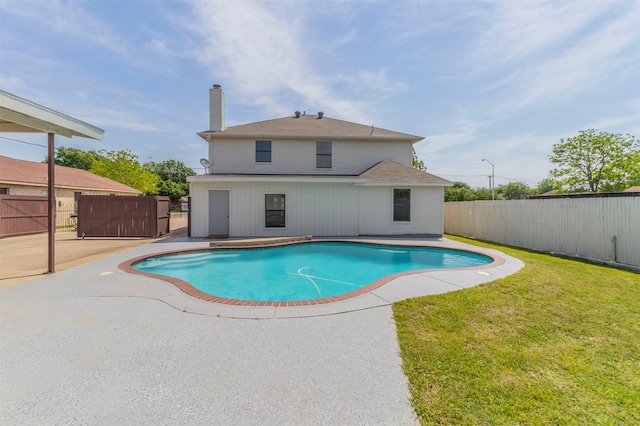 view of pool featuring a fenced backyard, a fenced in pool, a patio, and a yard