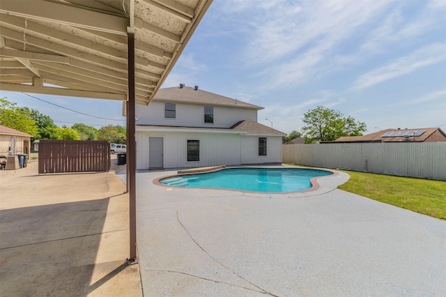 view of swimming pool featuring a fenced backyard, a fenced in pool, and a patio area