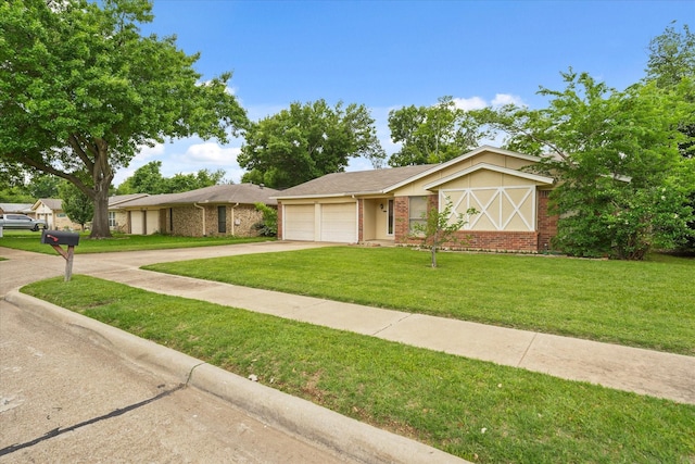 ranch-style house featuring an attached garage, concrete driveway, brick siding, and a front yard