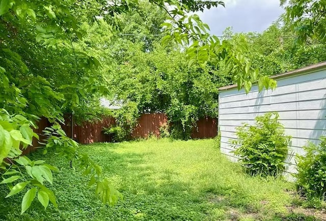 1003 Epenard St, Dallas, TX 75211 - view of yard featuring fence