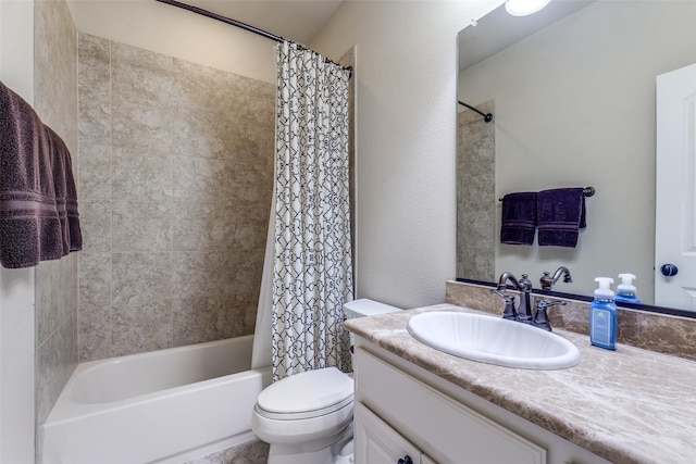 bathroom with vanity, shower / bath combo, and toilet