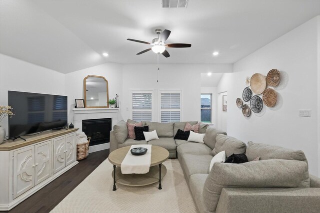 living area with visible vents, recessed lighting, dark wood-style flooring, and ceiling fan