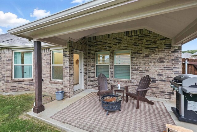 view of patio with a grill