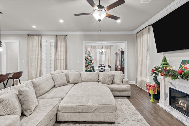 3940 Jeffery Kyle Dr, Shreveport, LA 71107 - living area featuring ornamental molding, ceiling fan with notable chandelier, recessed lighting, and wood finished floors