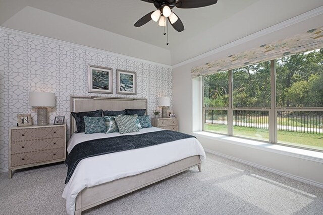 bedroom featuring baseboards, a ceiling fan, and carpet