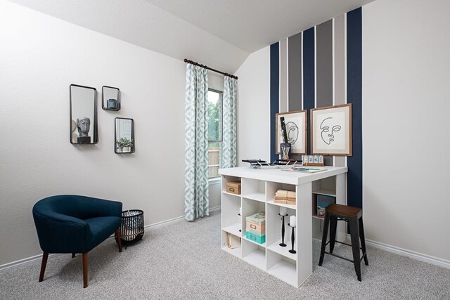 office area featuring baseboards, carpet floors, and lofted ceiling