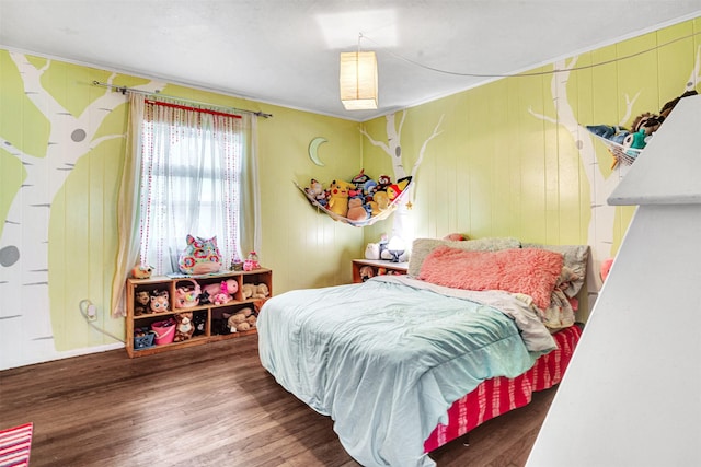 208 Johnson St, Seagoville, TX 75159 - bedroom featuring crown molding and wood finished floors