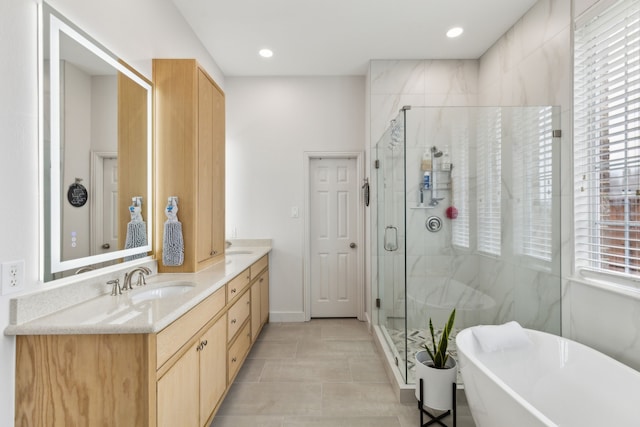 401 Willow Run, Prosper, TX 75078 - full bath featuring plenty of natural light, a freestanding bath, a stall shower, double vanity, and recessed lighting