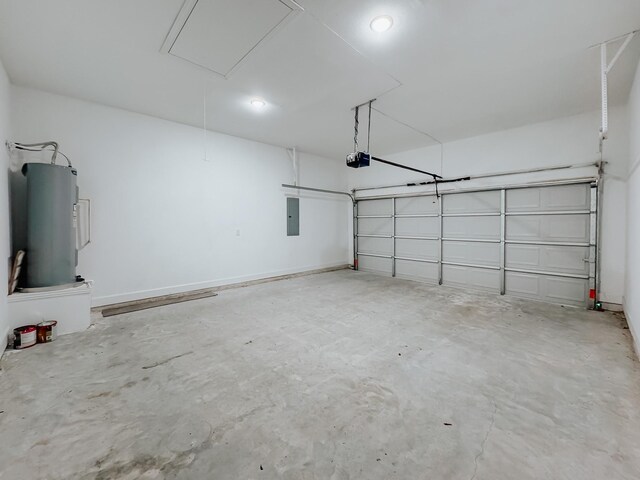 garage featuring water heater, a garage door opener, and electric panel