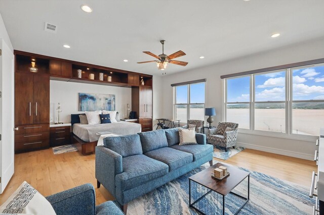 bedroom featuring recessed lighting, baseboards, visible vents, and light wood-style flooring