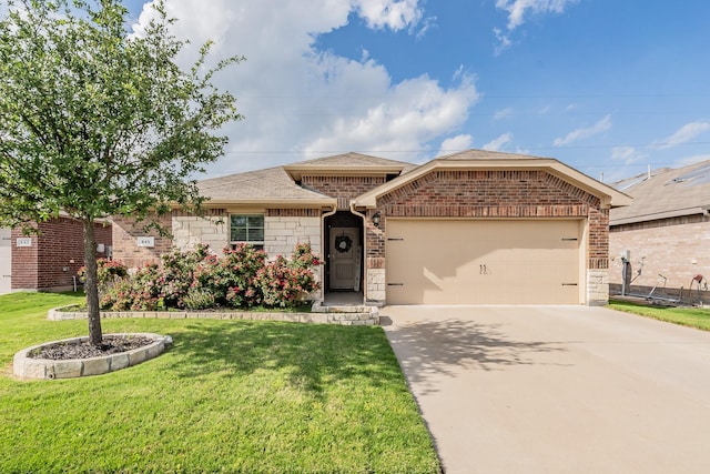 ranch-style house with a front yard, brick siding, concrete driveway, an attached garage, and a shingled roof