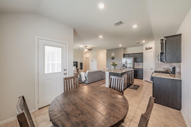 dining space featuring visible vents, light tile patterned flooring, baseboards, ceiling fan, and recessed lighting