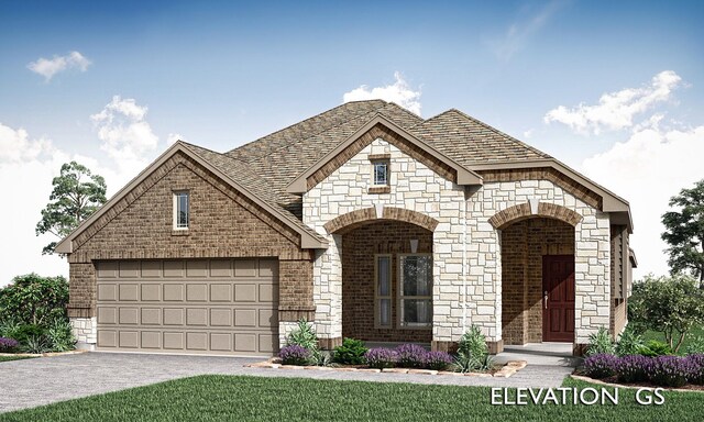 view of front of house with a garage, stone siding, driveway, and brick siding