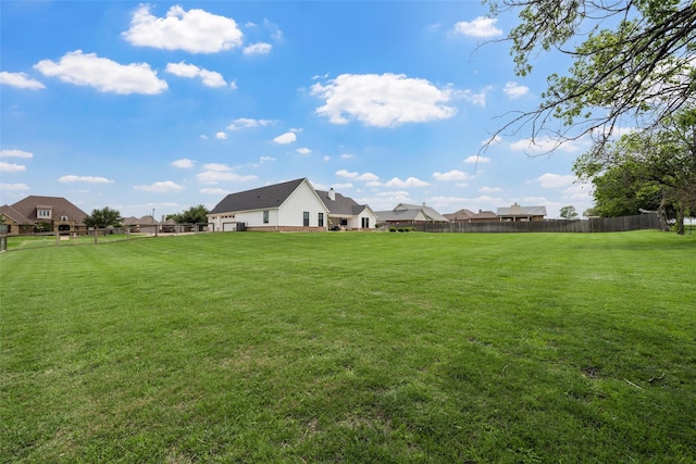 view of yard with fence