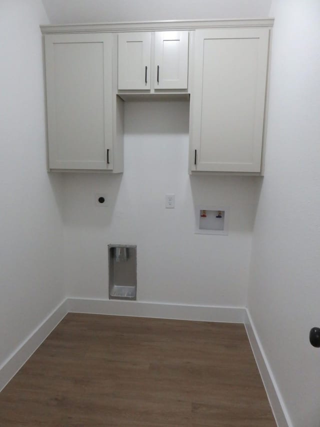 clothes washing area featuring hookup for an electric dryer, baseboards, dark wood-type flooring, and hookup for a washing machine