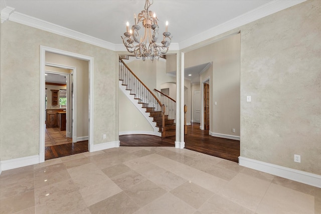 tiled empty room with baseboards, arched walkways, stairs, and ornamental molding