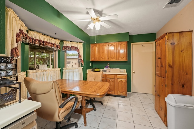 2609 Kimberly Dr, Garland, TX 75040 - dining area with a ceiling fan, visible vents, and marble finish floor