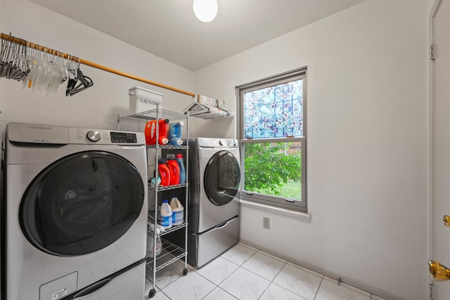 2609 Kimberly Dr, Garland, TX 75040 - laundry area with independent washer and dryer, laundry area, and a healthy amount of sunlight