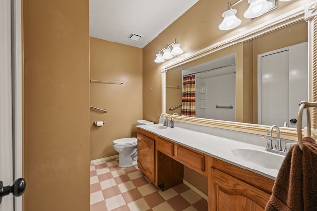 2609 Kimberly Dr, Garland, TX 75040 - full bathroom featuring a sink, double vanity, toilet, tile patterned floors, and visible vents