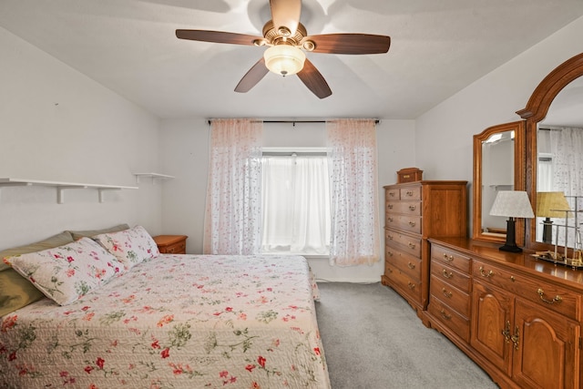 2609 Kimberly Dr, Garland, TX 75040 - bedroom with light carpet and a ceiling fan