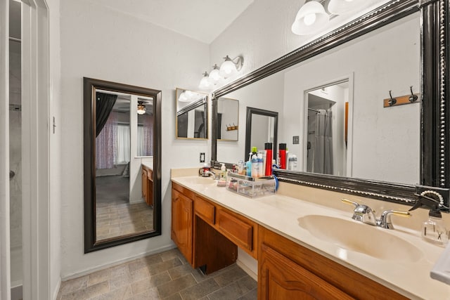 2609 Kimberly Dr, Garland, TX 75040 - full bathroom featuring double vanity and a sink