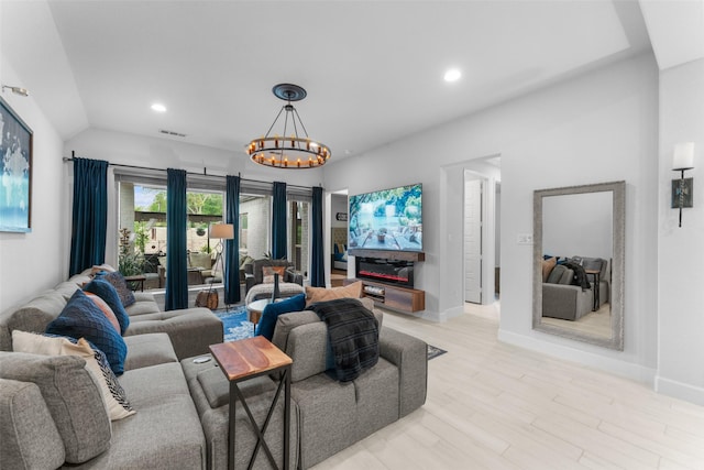 living room featuring a notable chandelier, light wood finished floors, recessed lighting, baseboards, and visible vents