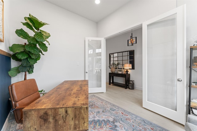 home office featuring baseboards, french doors, recessed lighting, and wood finished floors