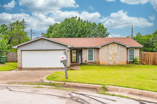 4212 Selina Ct, Arlington, TX 76016 - view of front of property with asphalt driveway, a garage, and brick siding