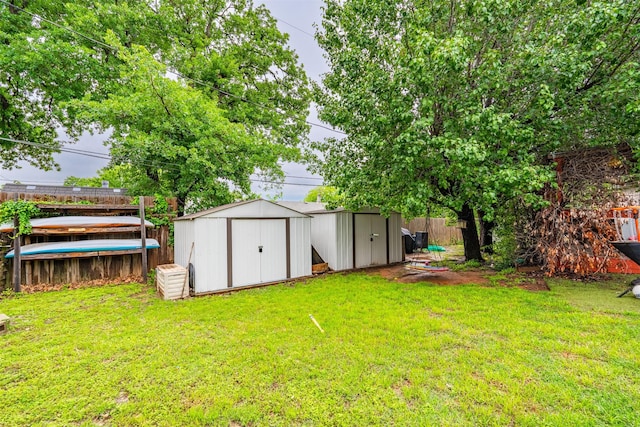 4212 Selina Ct, Arlington, TX 76016 - view of yard with a storage shed and an outbuilding
