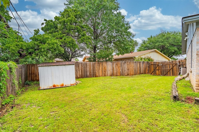 4212 Selina Ct, Arlington, TX 76016 - view of yard featuring a storage unit and an outbuilding