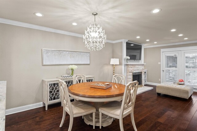 dining room featuring crown molding, recessed lighting, and baseboards